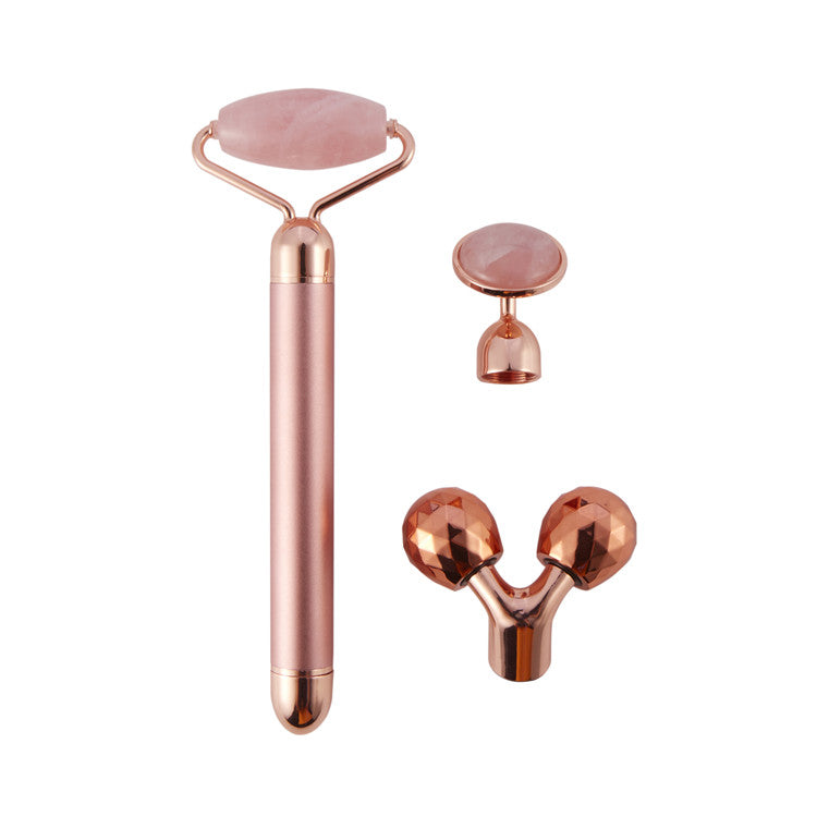 Grace Beauty gemstone 3-in-1 electric face and body sculpting roller showing smooth roller heads and ergonomic handle for anti-aging therapy.