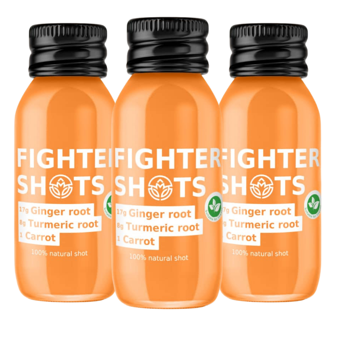 Fighter Shots vegan wellness shot with carrot, ginger, and turmeric in a 60ml glass bottle, front view.