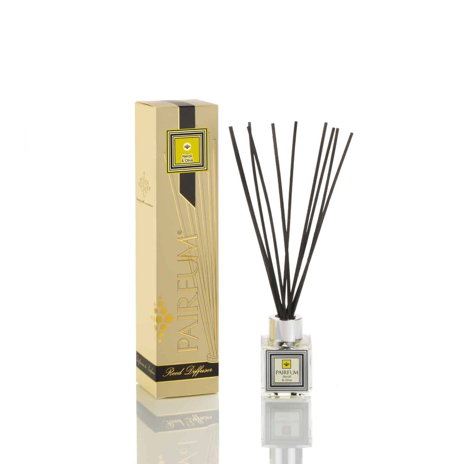 Pairfum London luxury reed diffuser with 50ml eau de parfum in Neroli & Olive scent, featuring 10 black reeds and elegant packaging.