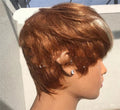 Short brown wig with golden highlights by Cashymart, showcasing layered, natural-looking hair for stylish versatility.
