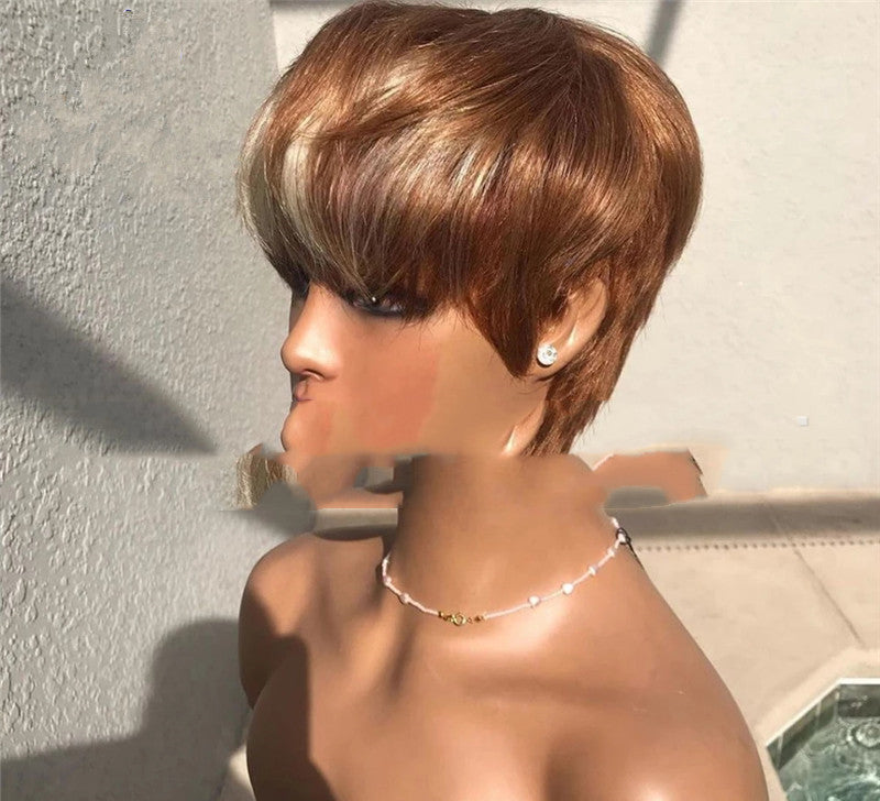 Short wig with brown and golden highlights by Cashymart, featuring a stylish, natural-looking hairdo with layered, textured hair.