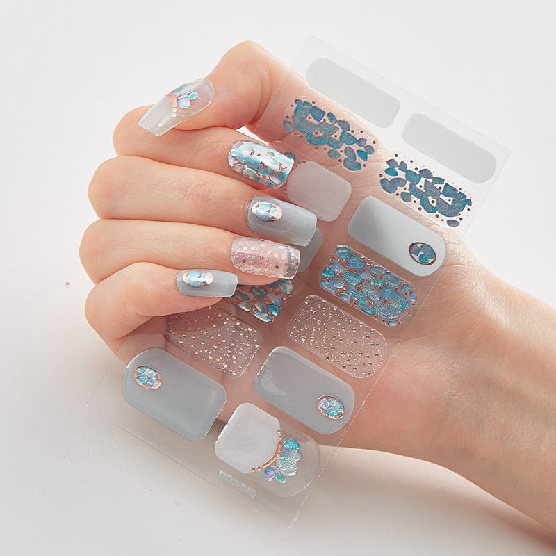 Butterfly laser nail stickers by Cashymart for chic nail styling, featuring colorful butterfly designs on a glossy nail surface.