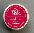 White Rabbit Skin Care organic tinted balm on lips, showing natural color and smooth texture for lips and cheeks.