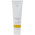 Dr. Hauschka Rose Day Cream 30ml moisturizer in a jar, suitable for sensitive skin, displayed with fresh roses in the background.