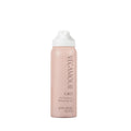 British Harmonia VEGAMOUR GRO Dry Shampoo Travel Size 1.8 oz, volumizing, benzene-free with bergamot scent, in application.